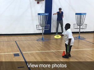 View more photos of kindergarten students playing disc golf